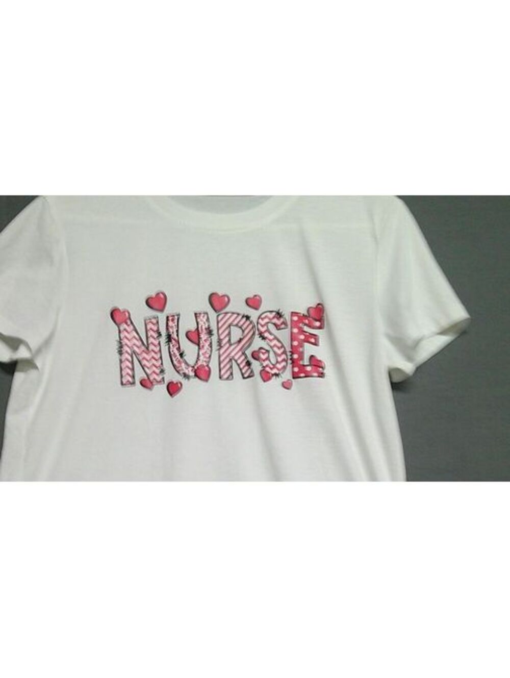 White Nurse Graphic T-Shirt with Heart Design Women M